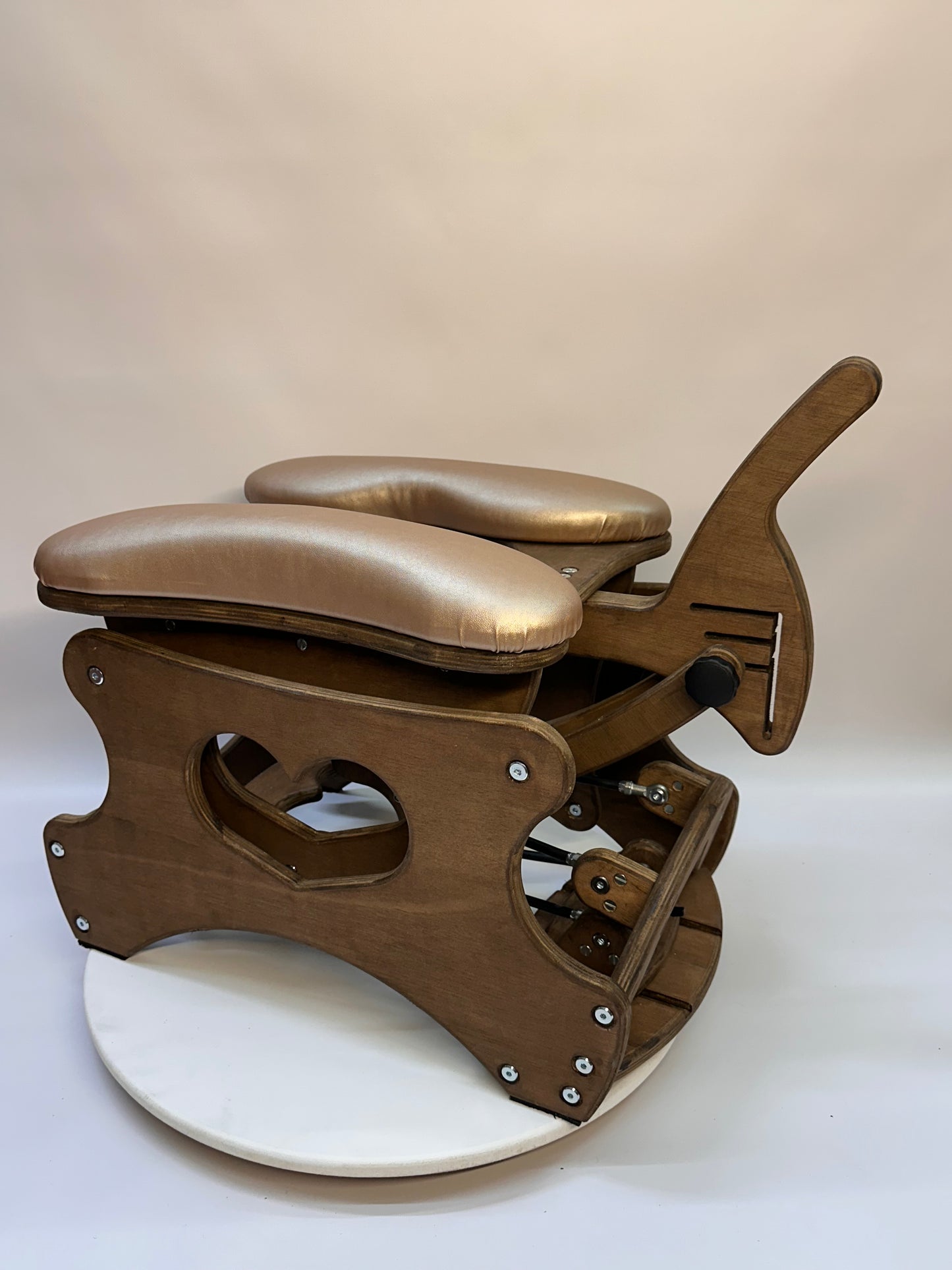 Elegant luxury rocking chair from hardwood with faux leather upholstery. Designed for intimacy, featuring adjustable angles, depth settings, and an optional vibration function. Ball-bearing rocking mechanism ensures effortless motion and stability. Monkey Rocker Glider Chair